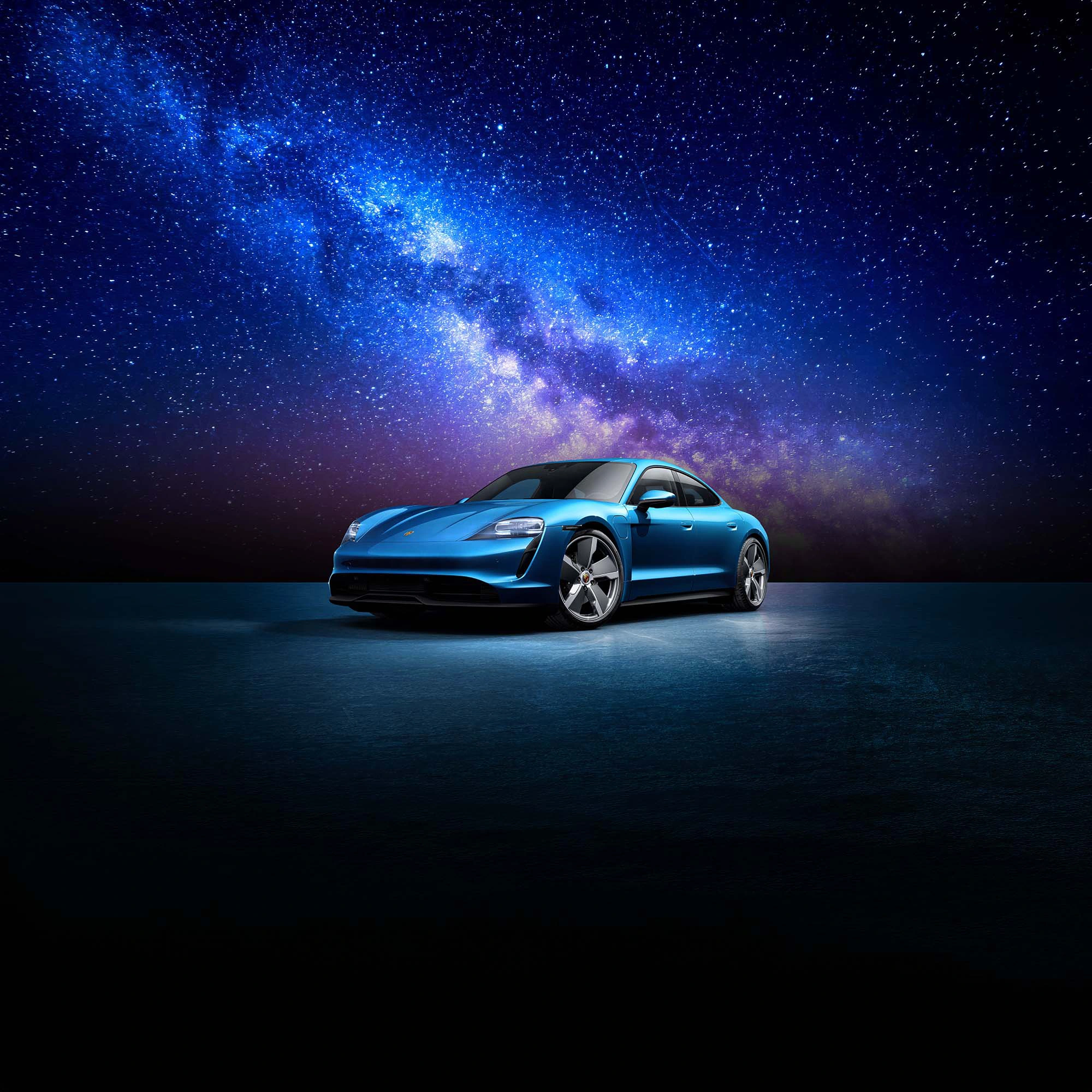 Blauwe Porsche tegen een sterrenhemel voor de Dealer Strategy Meeting